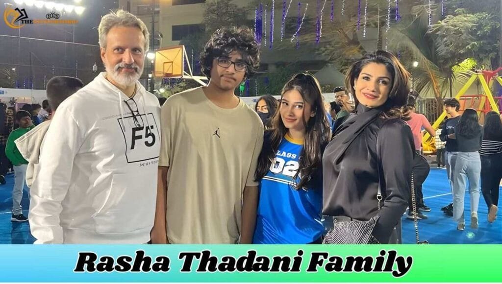 Rasha Thadani posing with her family including Raveena Tandon and Anil Thadani at an event