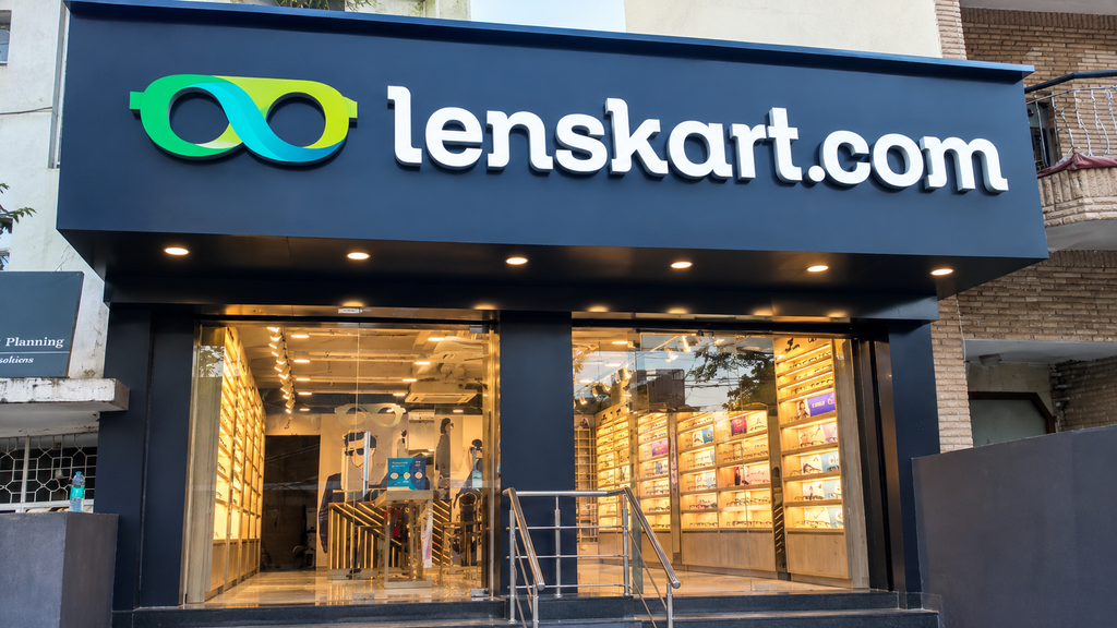 Lenskart.com retail store exterior with branded storefront, eyeglasses displays and showroom entrance
